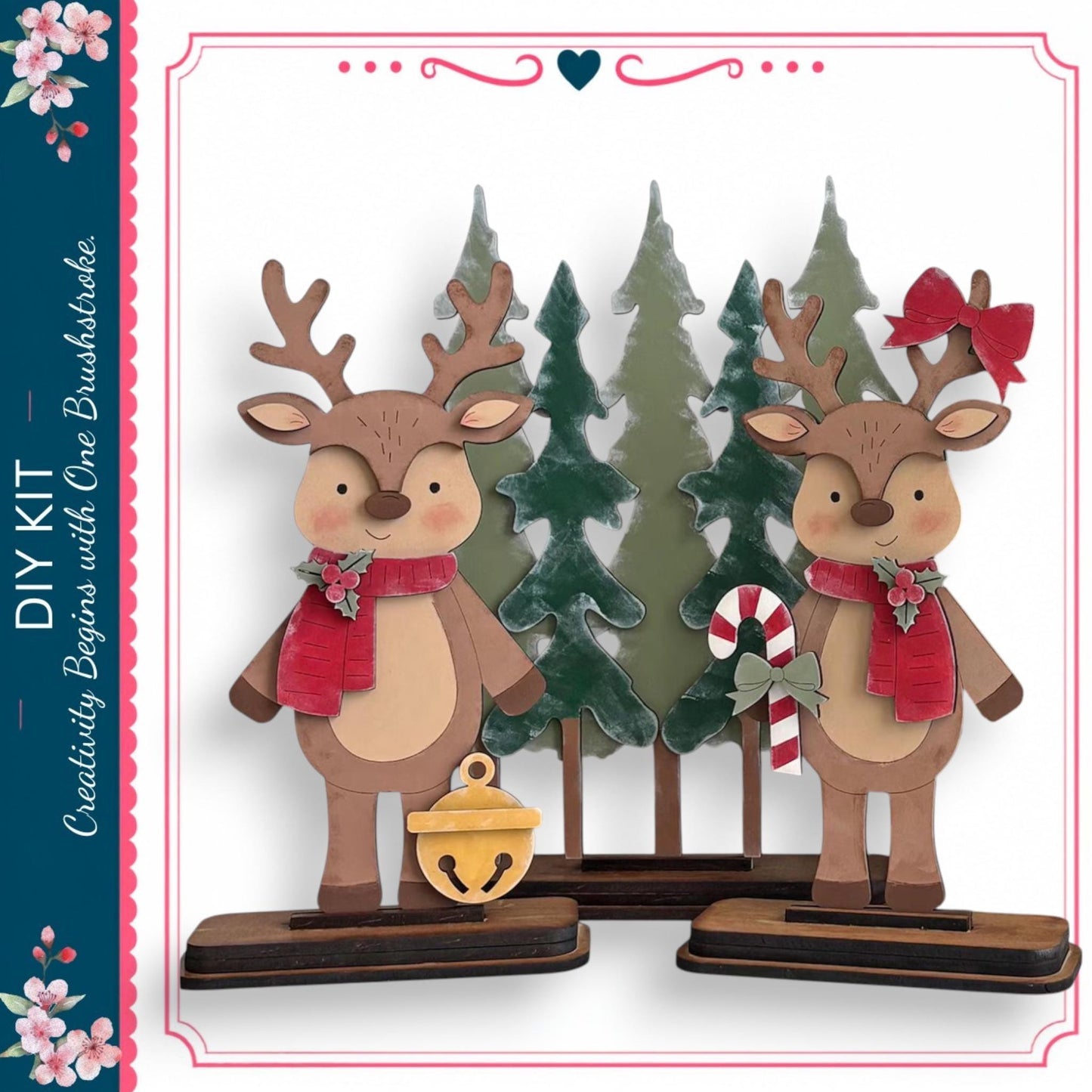 two wooden reindeer figures standing in front of a Christmas tree, with a candy cane and bell nearby.