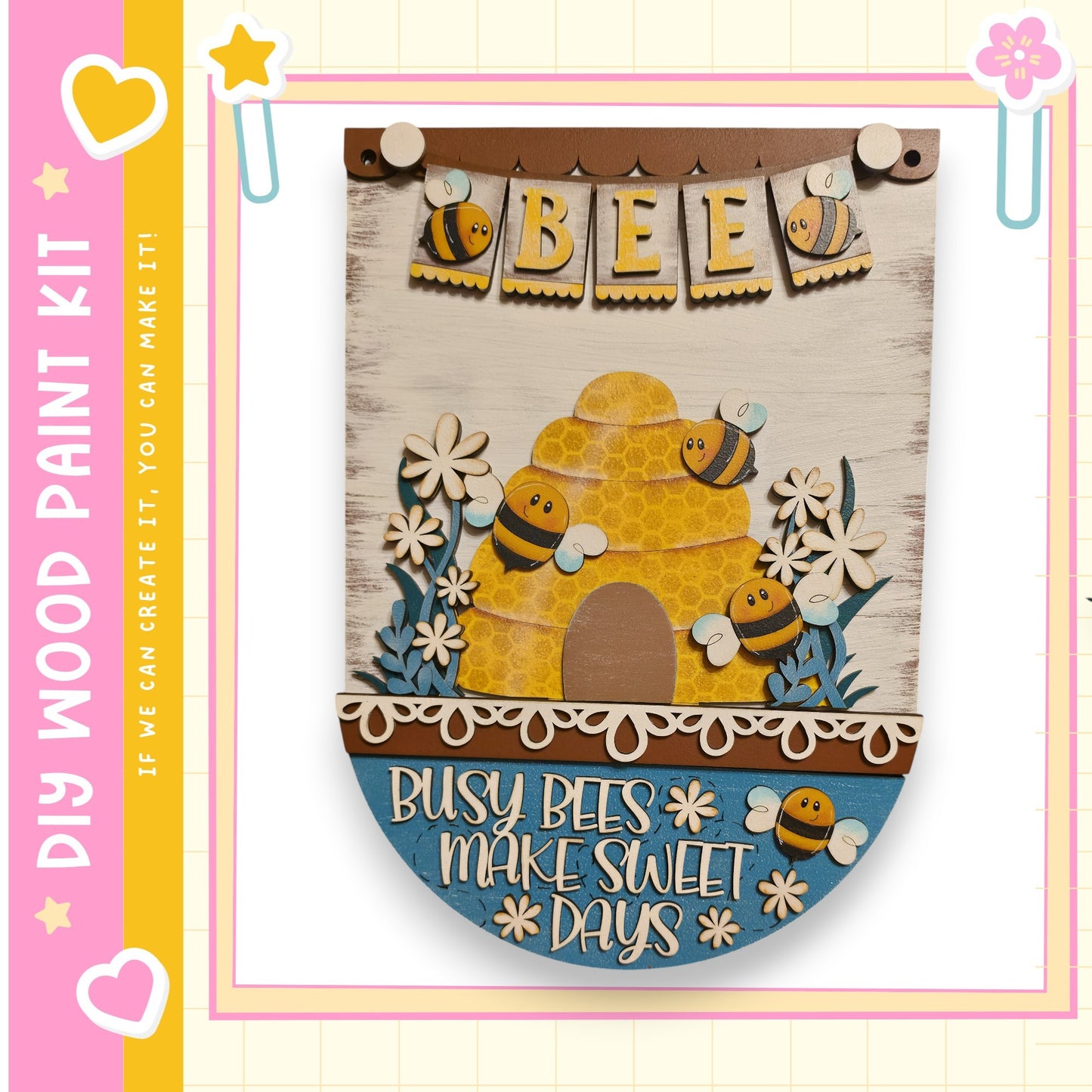 The image is a wooden sign featuring a beehive and the text "Busy bees make sweet days" in a decorative and playful style.