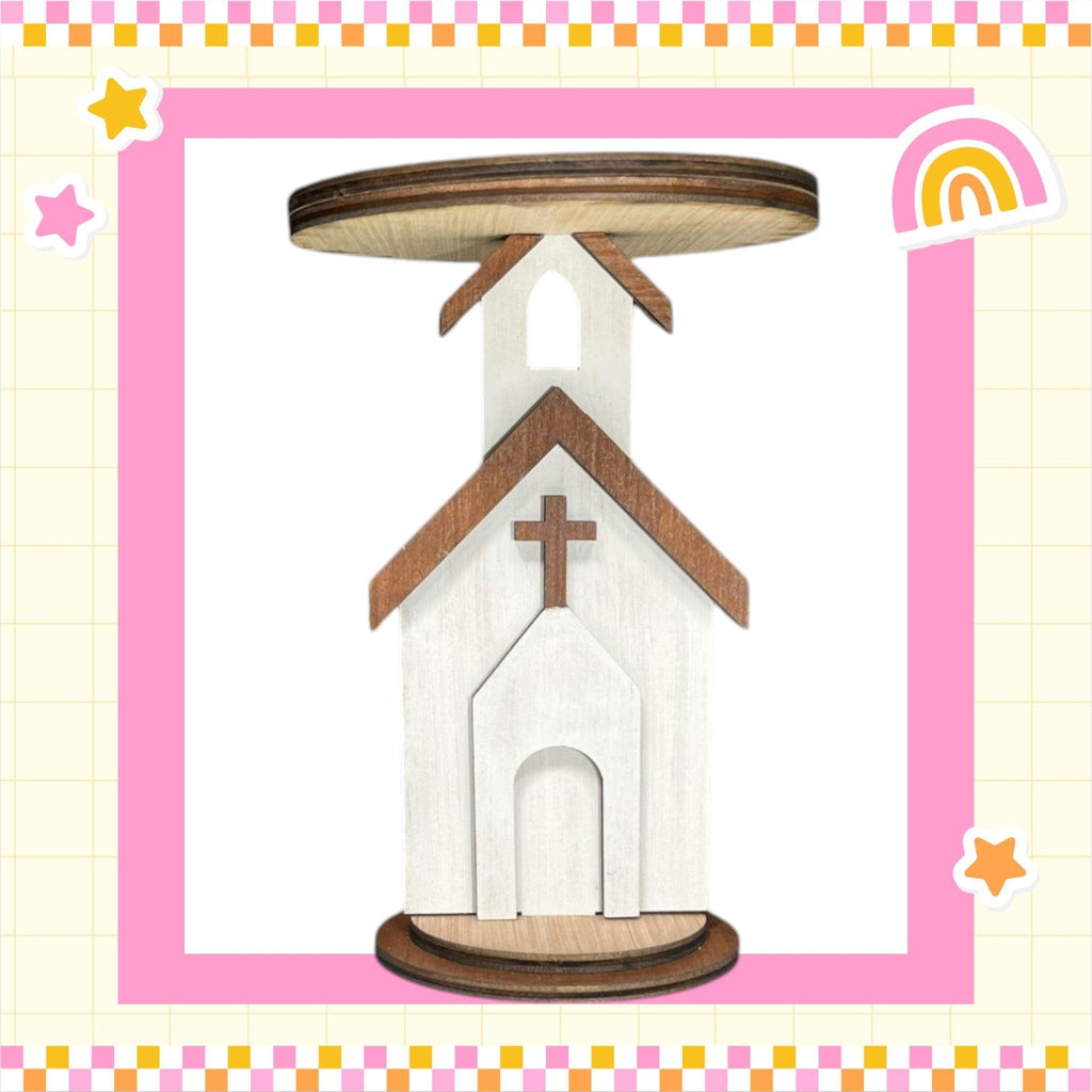 a picture of a church with a cross on it
