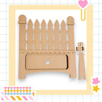 a cardboard cutout of a wooden fence