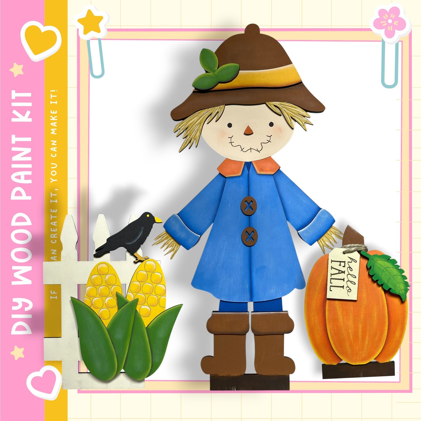 A wooden paint kit depicting a scarecrow with a pumpkin and corn, along with a black bird.