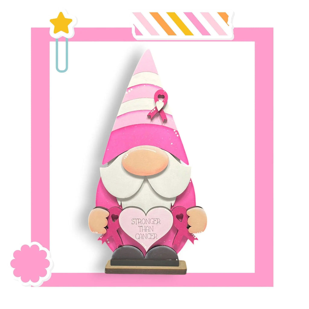 a pink and white gnome with a heart