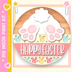The image is a circular sign with a wooden border, featuring a white bunny and the text "Happy Easter" in a pink and yellow color scheme.
