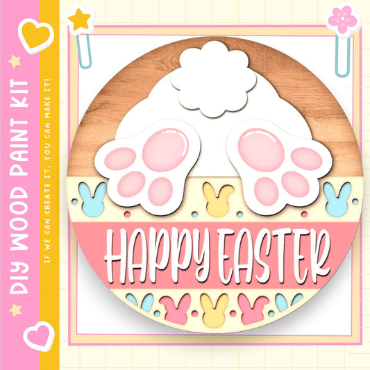 The image is a circular sign with a wooden border, featuring a white bunny and the text "Happy Easter" in a pink and yellow color scheme.