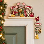 A festive holiday scene featuring a group of cartoon mice decorating a shelf with presents and cheese.