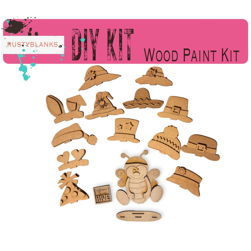 a wooden cutout of hats and other items