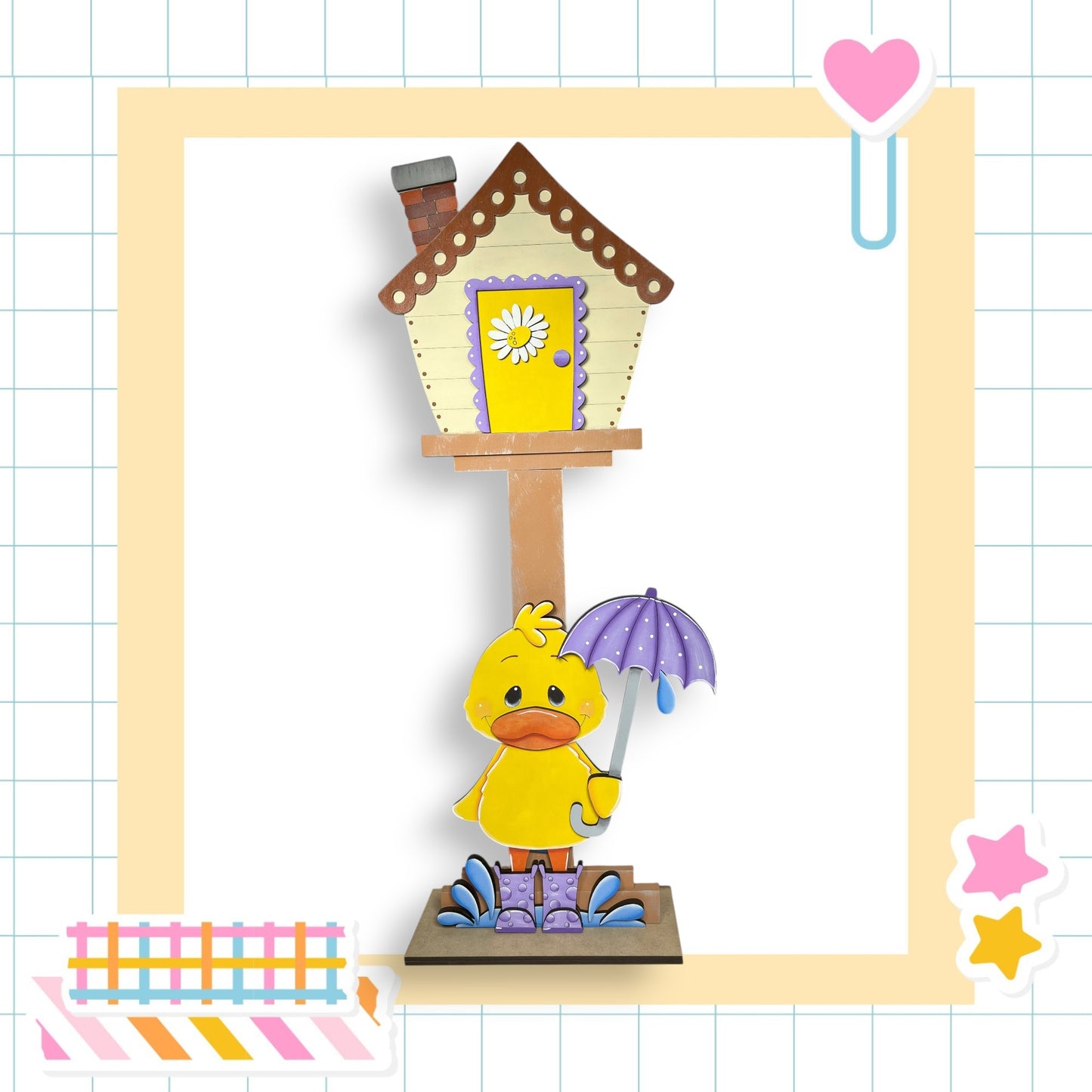 A yellow duck holding an umbrella and standing on a platform, with a small birdhouse nearby.
