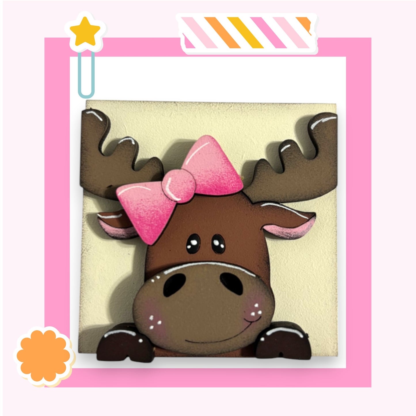 a picture of a moose with a pink bow