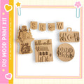 various wooden cutouts and decorations, including a snowman, a banner, and a snowflake-like design.