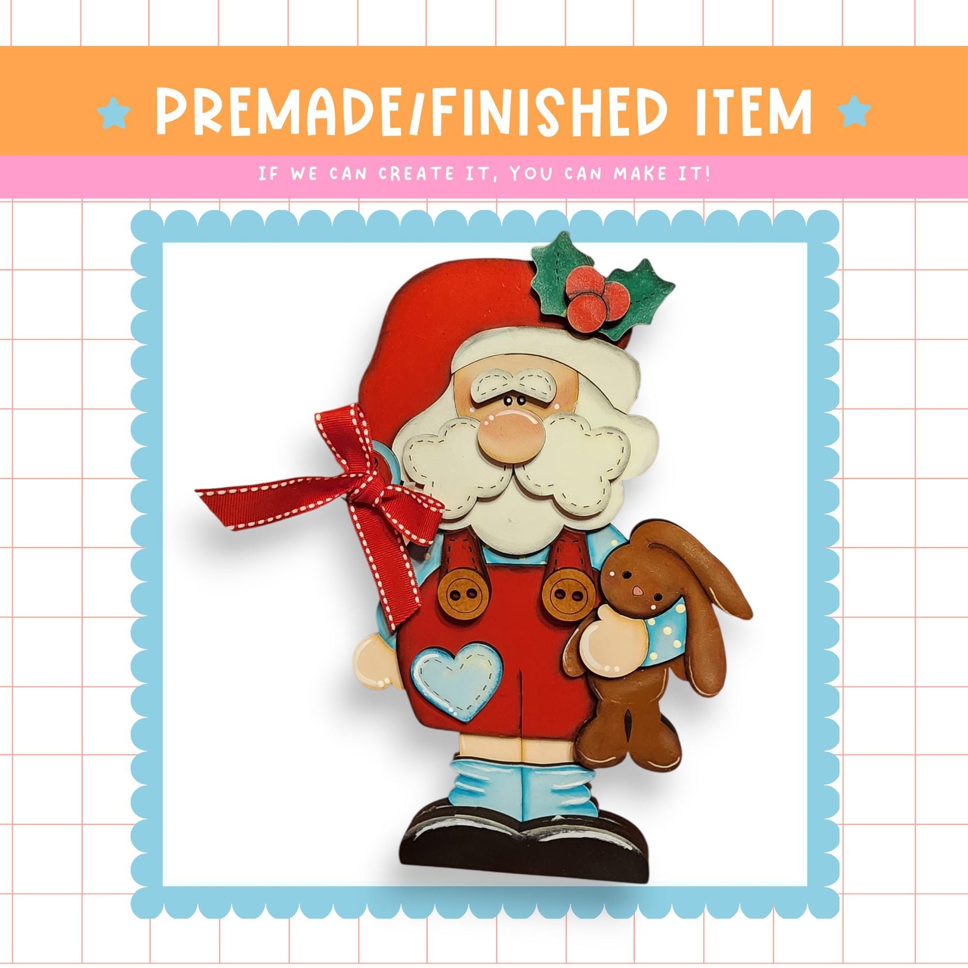 a wooden Santa Claus figure holding a brown bunny, with a red bow around his neck.