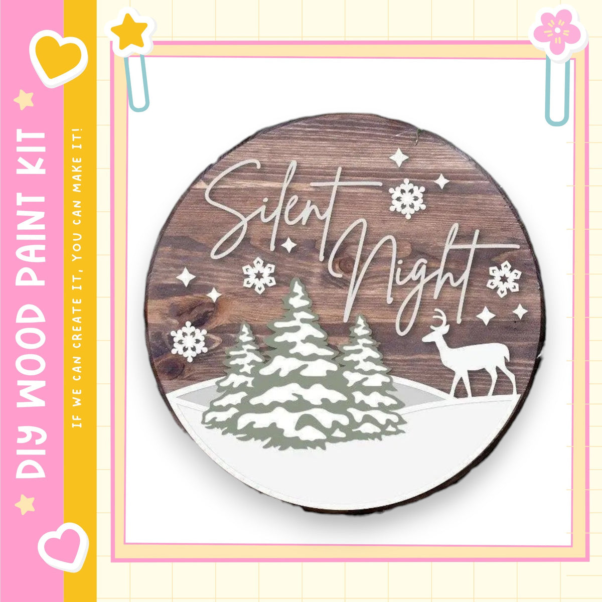 a wooden sign with the text "Silent Night" and a snow-covered forest scene with a deer.