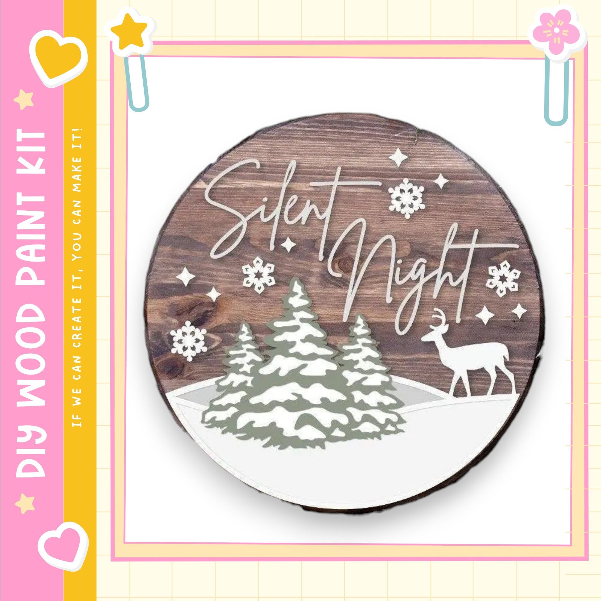 a wooden sign with the text "Silent Night" and a snow-covered forest scene with a deer.