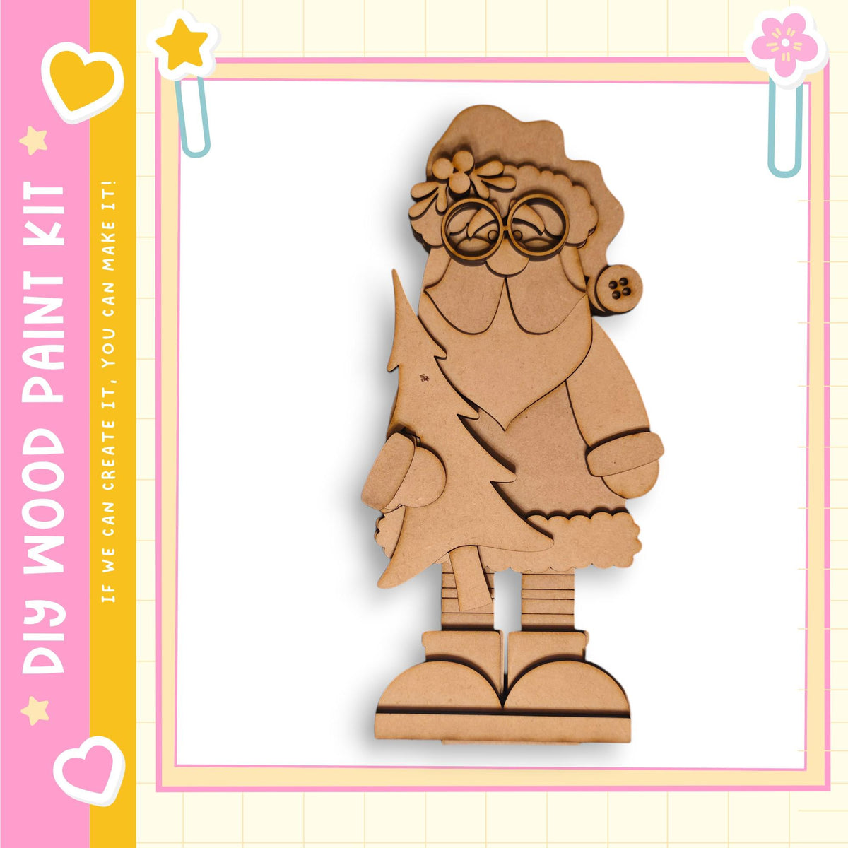 A wooden Christmas ornament kit with a Santa Claus figure and a tree.