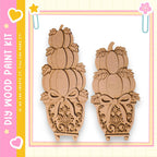 two wooden pumpkin planters with decorative bows, set against a pink and yellow background.