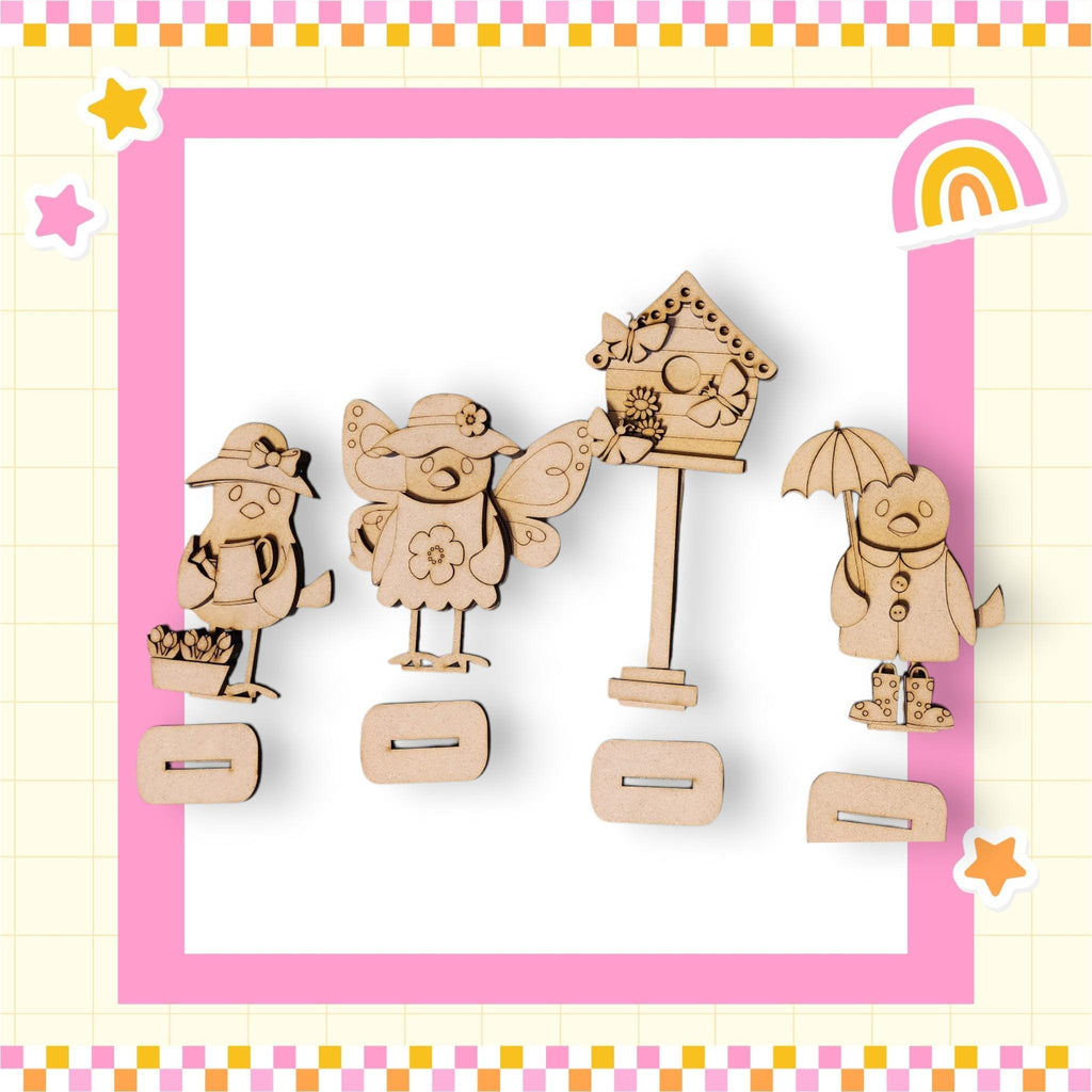 a group of wooden cut outs of animals