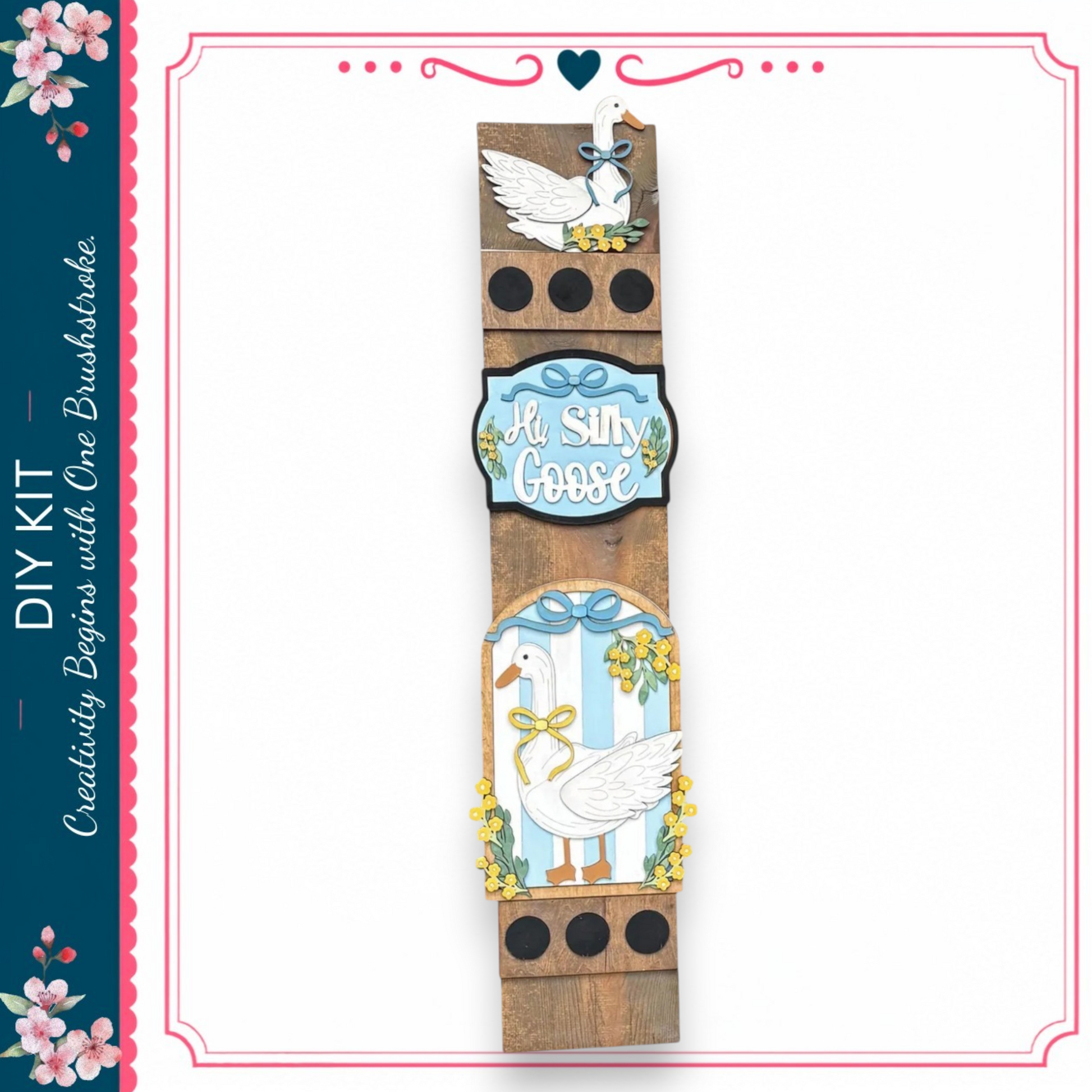 a wooden sign with decorative elements, including a goose and flowers, and the text "My Silly Goose" on it.
