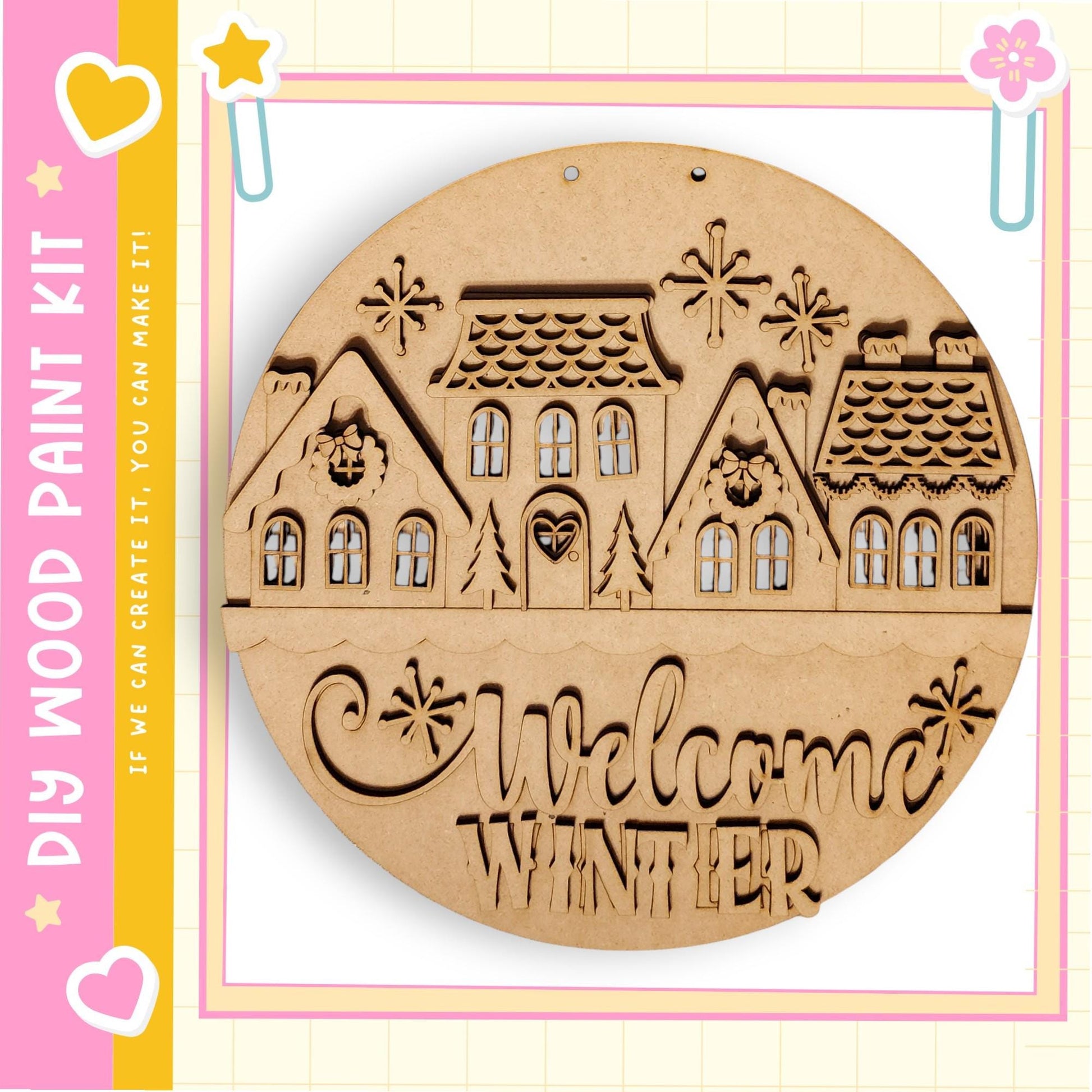 A wooden sign with a winter scene featuring houses, trees, and snowflakes. The sign has the text "Welcome Winter" carved into it.