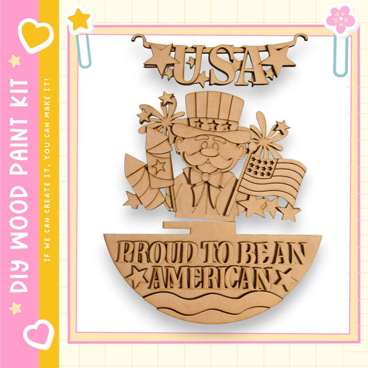 The image is a wooden craft kit featuring a patriotic design with a figure wearing a top hat and waving an American flag. The kit is labeled "USA" and "Proud to be an American", suggesting it is a patriotic project for creating a piece of art or decoration.