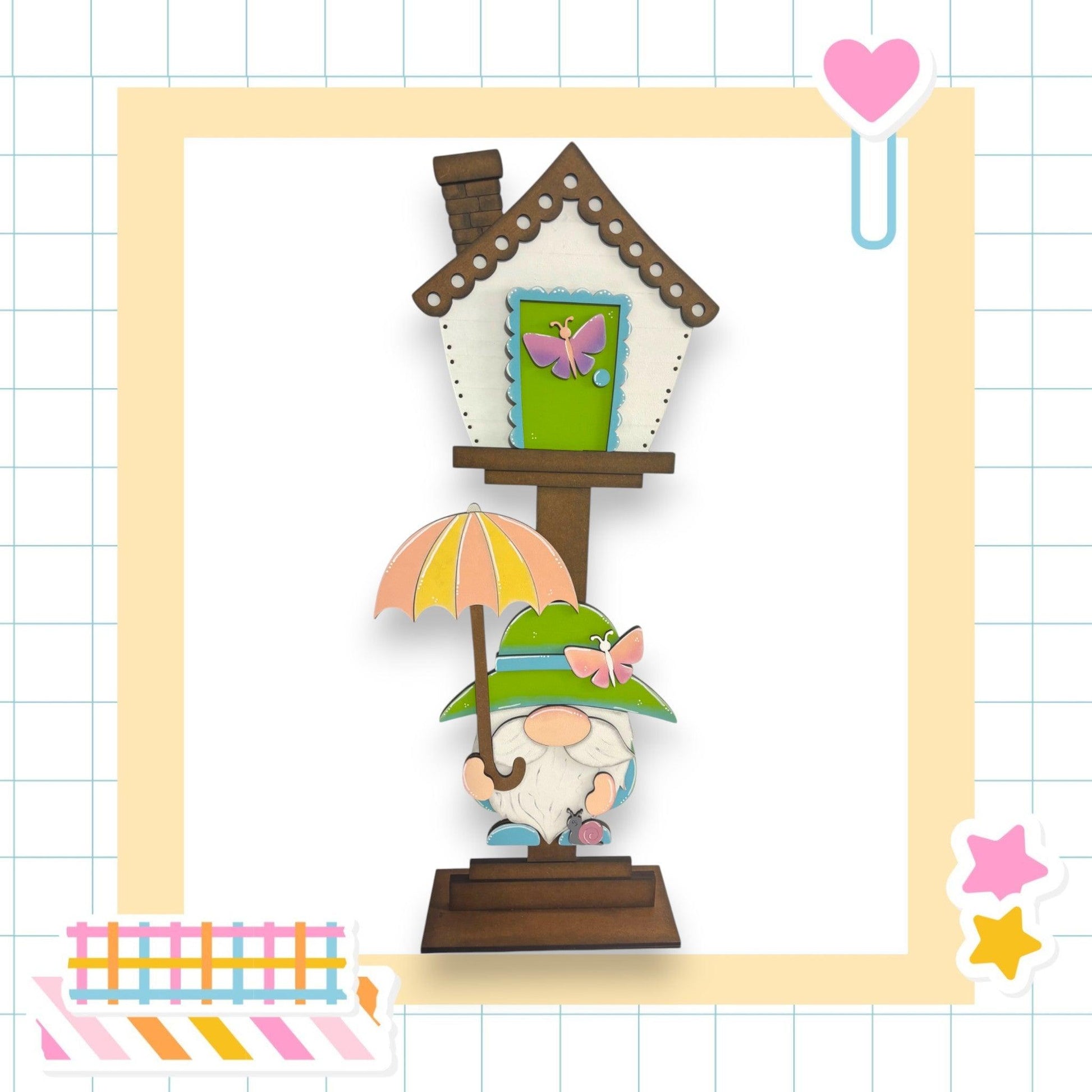 a card with a gnome holding an umbrella