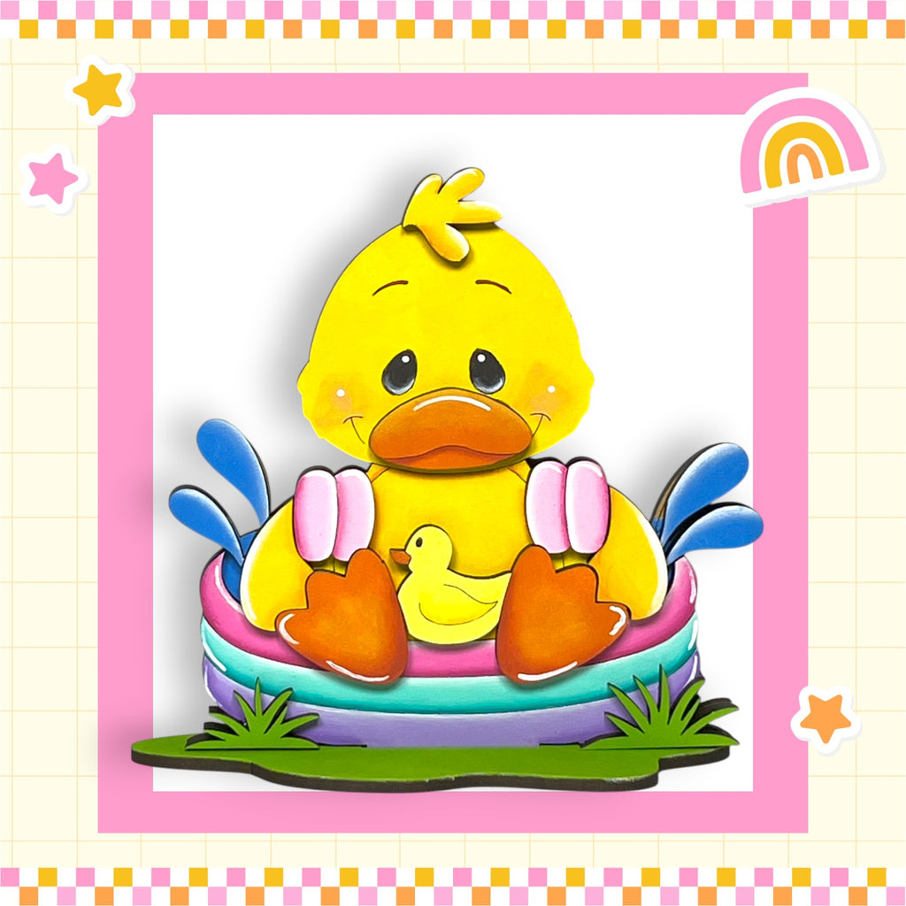 a yellow rubber ducky sitting in an inflatable pool