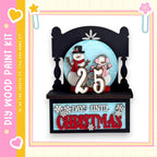 A snowman and a snowman figure on a shelf, with the number 25 displayed above them. The shelf has a sign that reads "25 DAYS UNTIL CHRISTMAS".