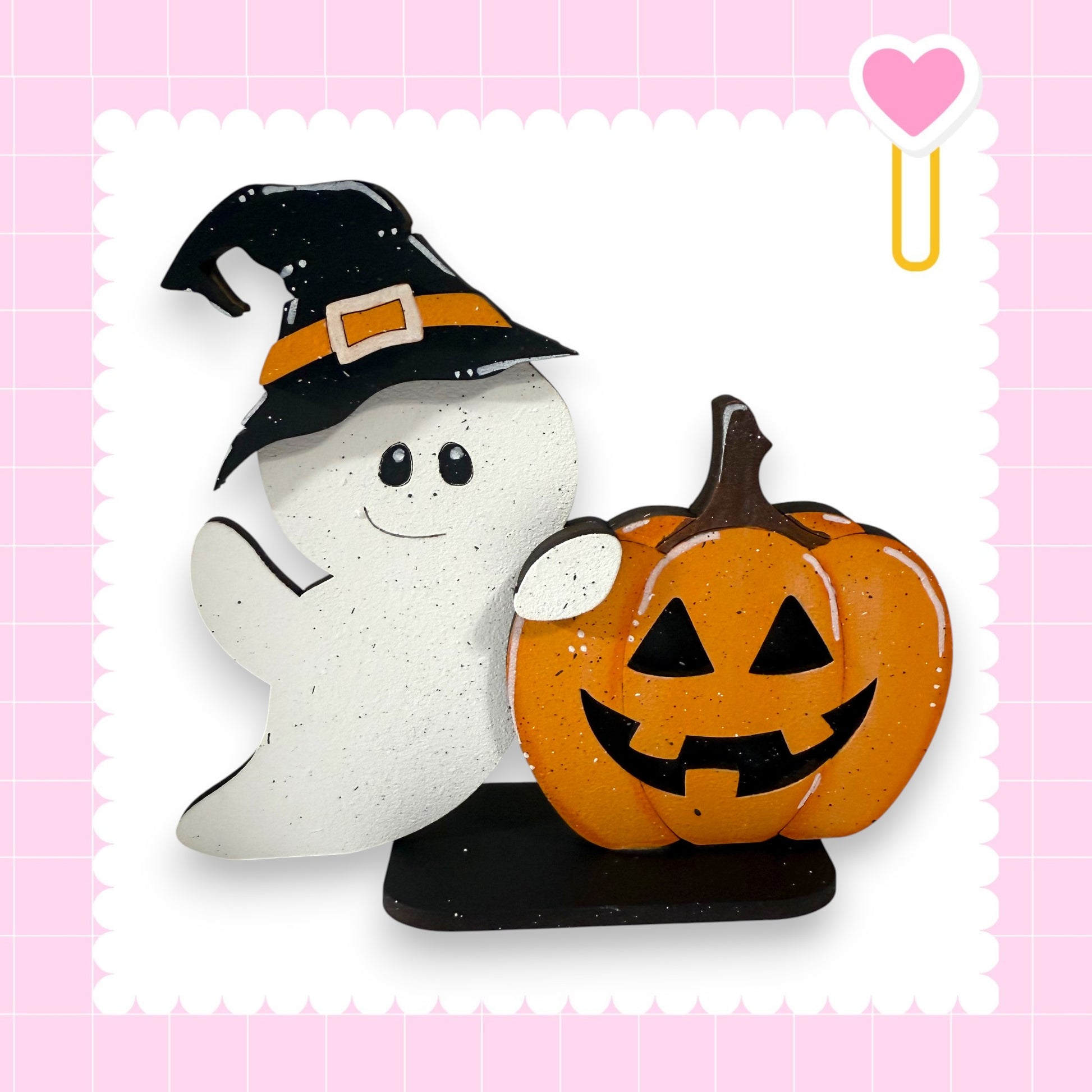A ghost and a carved pumpkin are featured in the image, both set against a pink background with a scalloped edge.