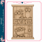 The image is a wooden shelf with various decorative elements, including a sign that says "U-Pick" and a sign that says "Sunflowers". The shelf also has a wheelbarrow and flowers, creating a charming and decorative scene.