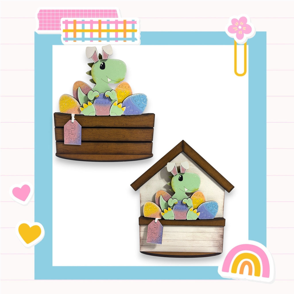 a green dragon sitting in a wooden basket, surrounded by various colorful Easter eggs and a rainbow-colored flower.
