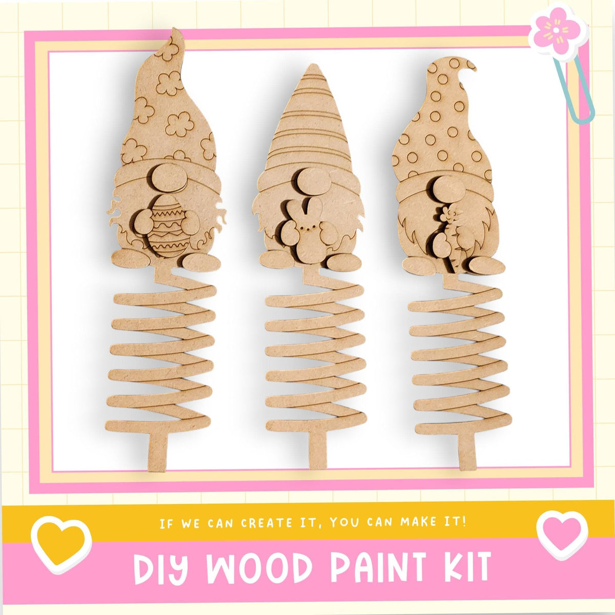 three wooden gnome-shaped ornaments, each with a unique design, displayed against a white background.