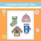 a picture of some knitted items on a card