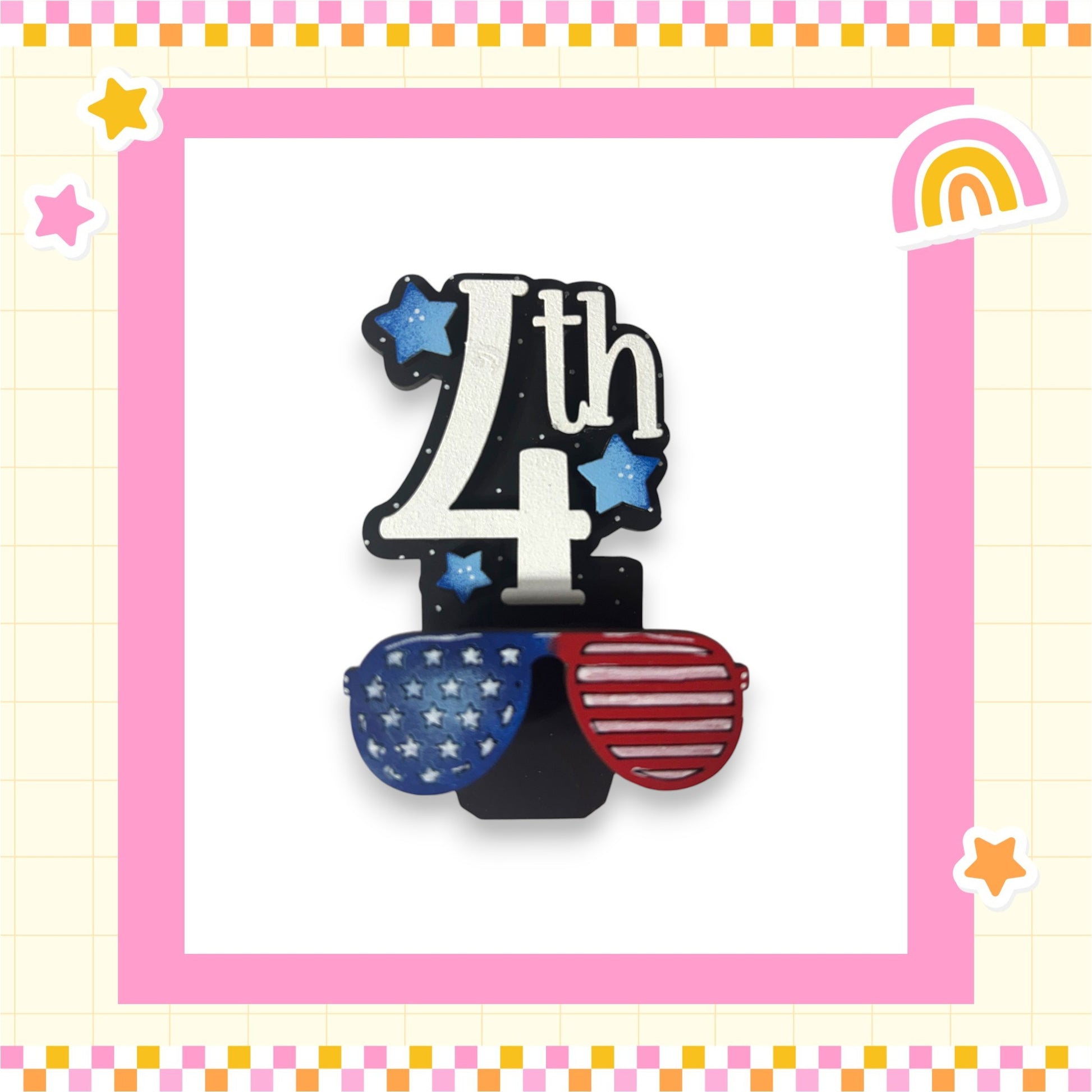 A 4th of July-themed decoration with sunglasses and stars, set against a pink and yellow checkered background.