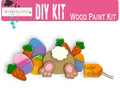 a picture of a wooden paint kit with carrots and a turtle