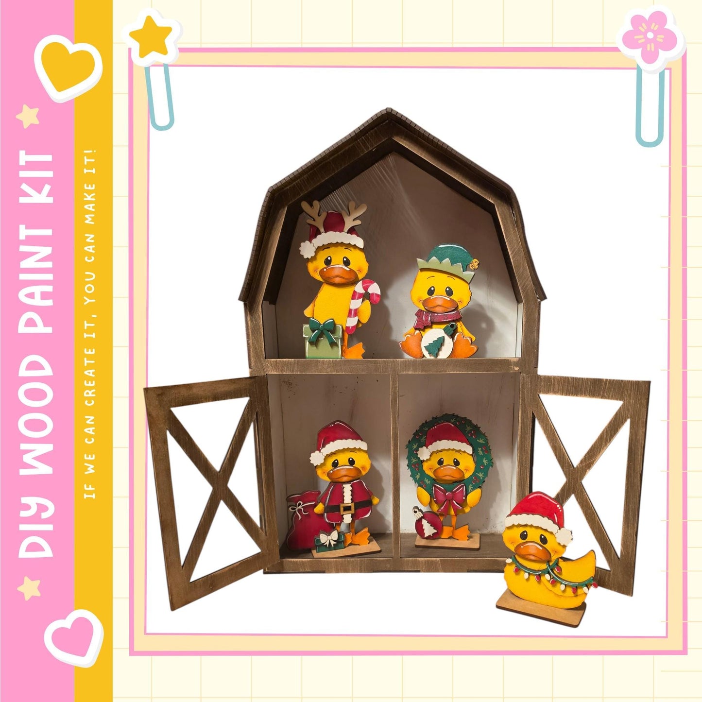 A wooden barn-shaped display case containing four small duck figurines, each wearing a unique hat and scarf, arranged inside the open barn.