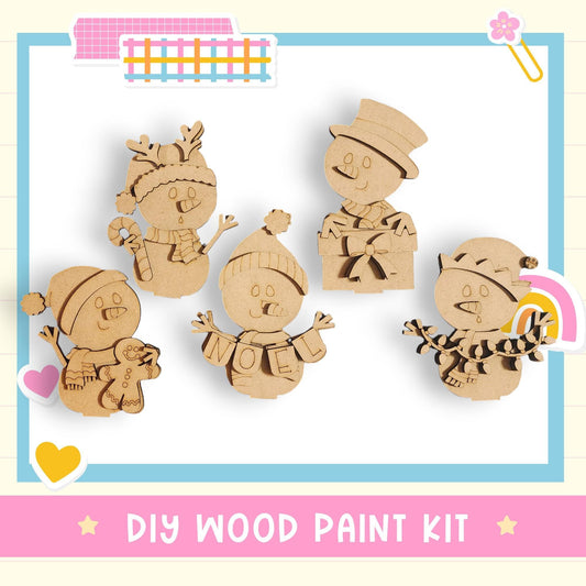 The image is a DIY wood paint kit featuring a collection of wooden snowmen and other snow-themed decorations.