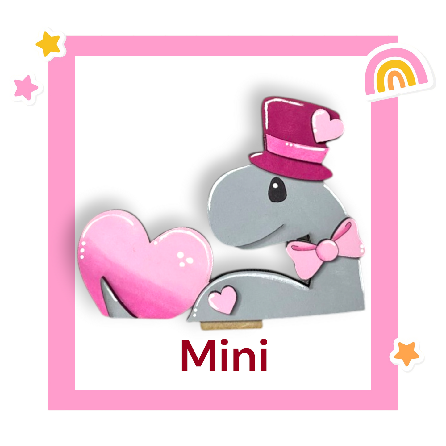 a picture of a pink and gray elephant with a pink heart