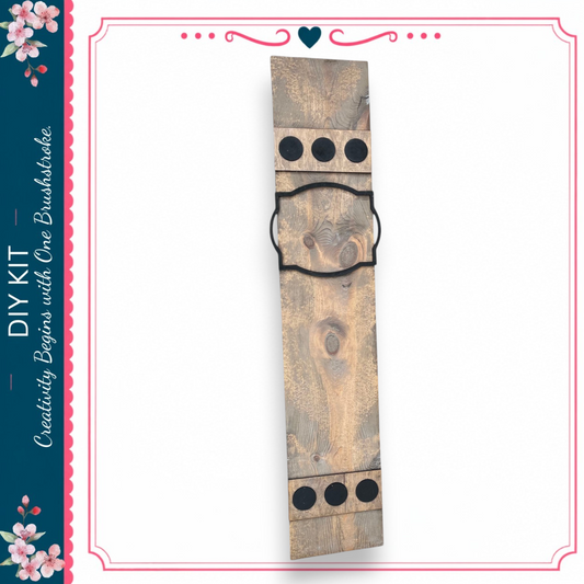 a wooden plank with circular holes on it, which appears to be a decorative piece.