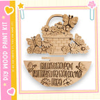 a wooden basket with a floral design and butterflies, along with a wooden sign that says "Wildflowers Welcome Here!"