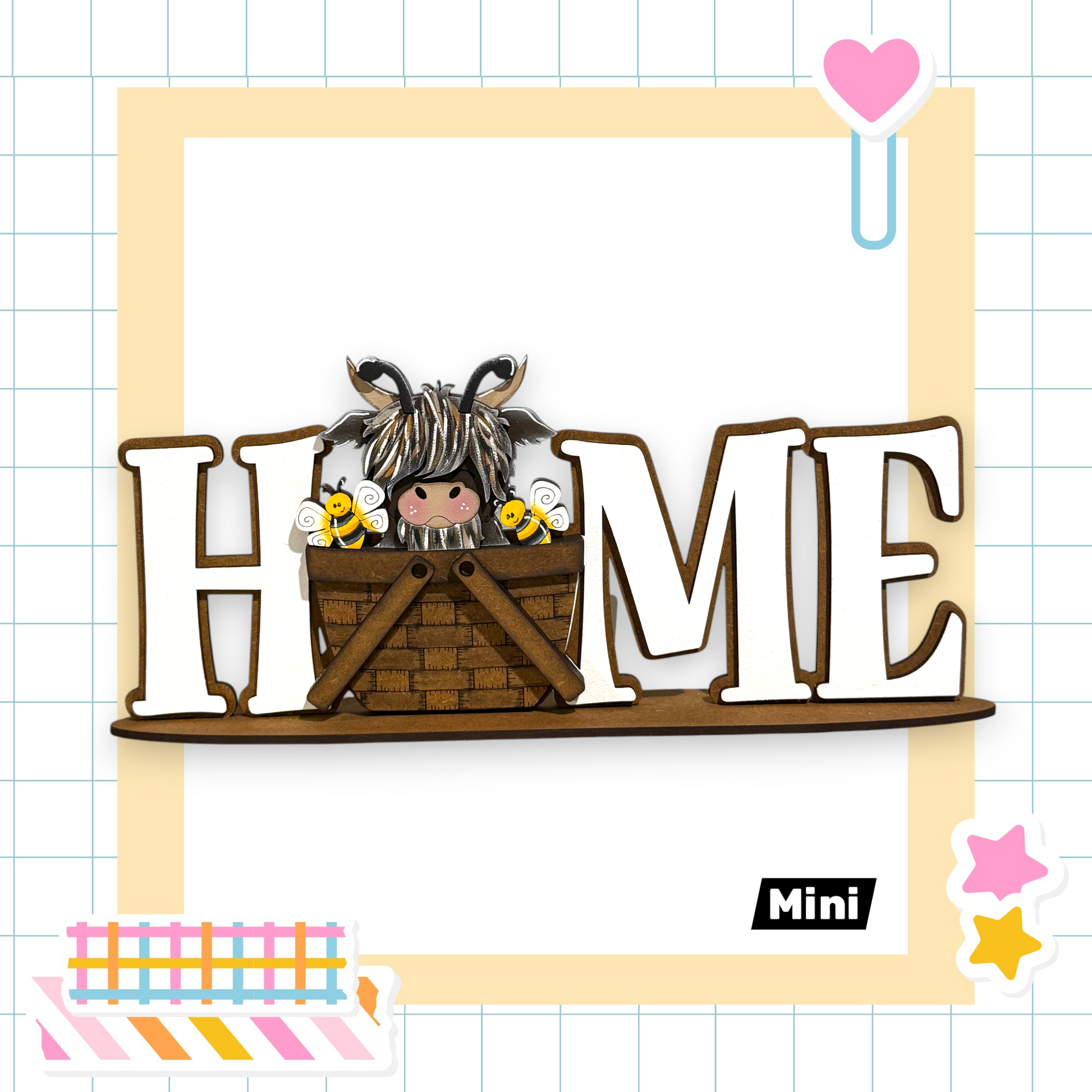 a wooden sign with the word "HOME" written on it, along with a small cartoon character, likely a bee, sitting inside a basket. The sign is surrounded by various colorful stickers and illustrations, creating a playful and whimsical atmosphere.