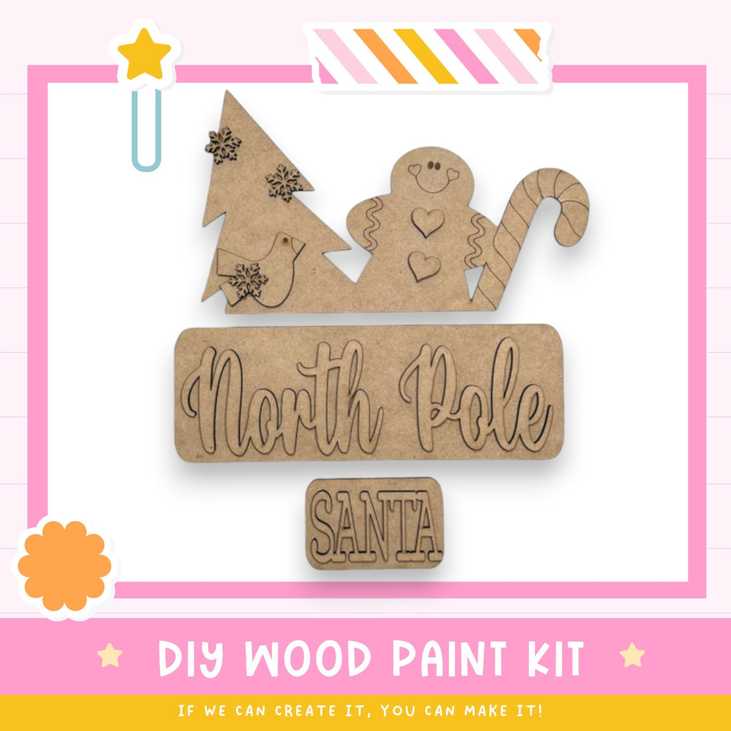 a wooden sign that says north pole santa