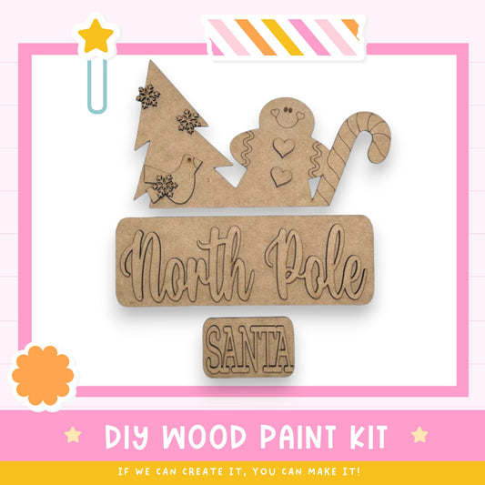 a wooden sign that says north pole santa