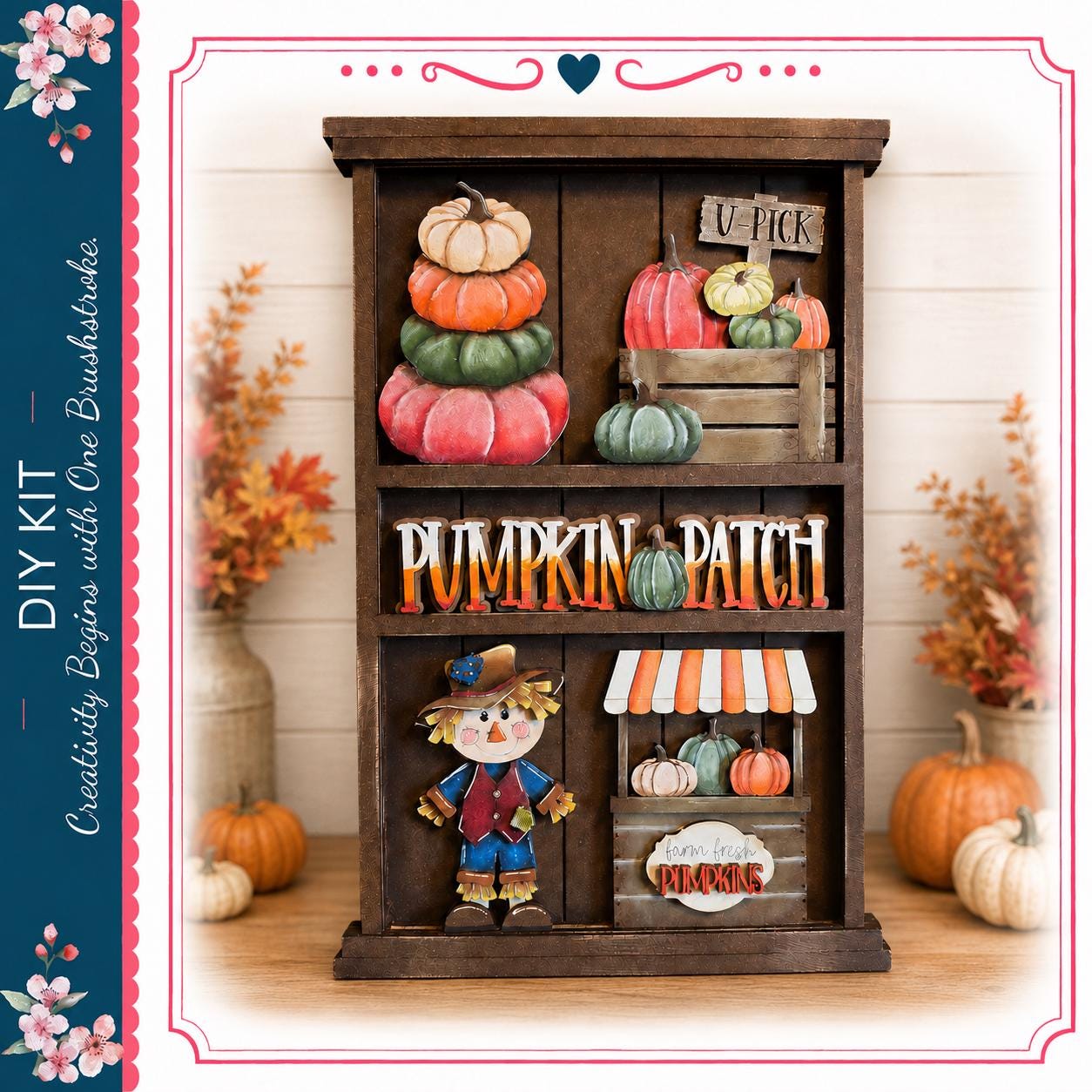 a wooden display case with various fall decorations, including pumpkins, a scarecrow, and other seasonal items. The display case has a rustic, homemade appearance, and the pumpkins are arranged in a visually appealing manner.