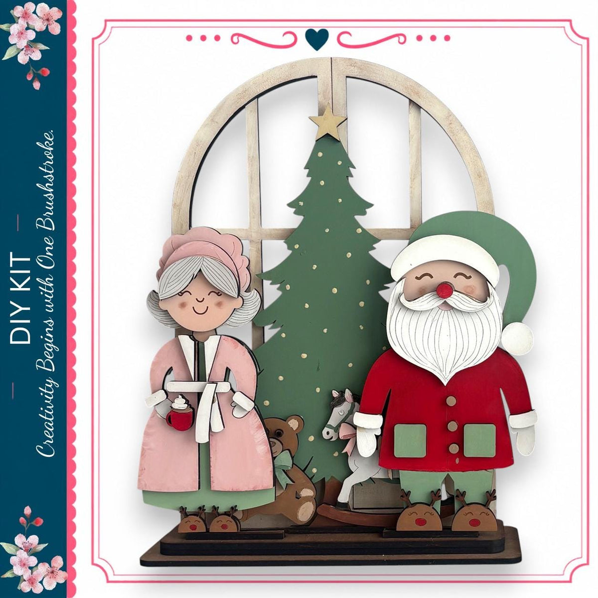 A DIY kit featuring a Christmas tree, Santa Claus, and a teddy bear, with a decorative border and floral elements.