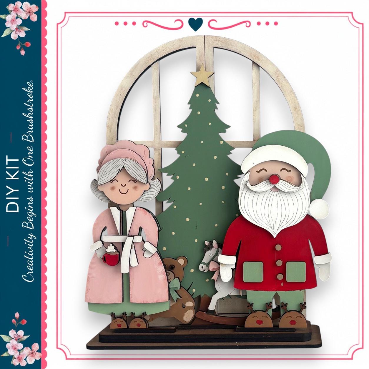A DIY kit featuring a Christmas tree, Santa Claus, and a teddy bear, with a decorative border and floral elements.