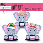 a couple of elephants with hats on their heads