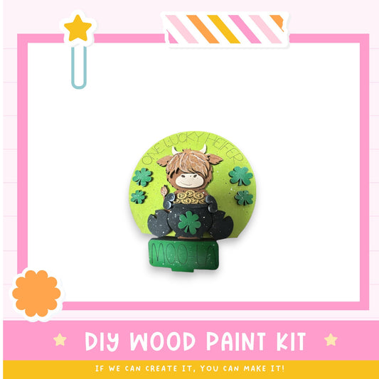 a paper craft kit with a picture of a girl sitting on a stool