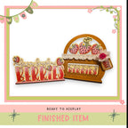 a wooden sign with the word "BERRIES" written on it, along with a basket of strawberries. The sign and basket are displayed in a pink and green frame, and the image is described as a finished item, ready to be displayed.