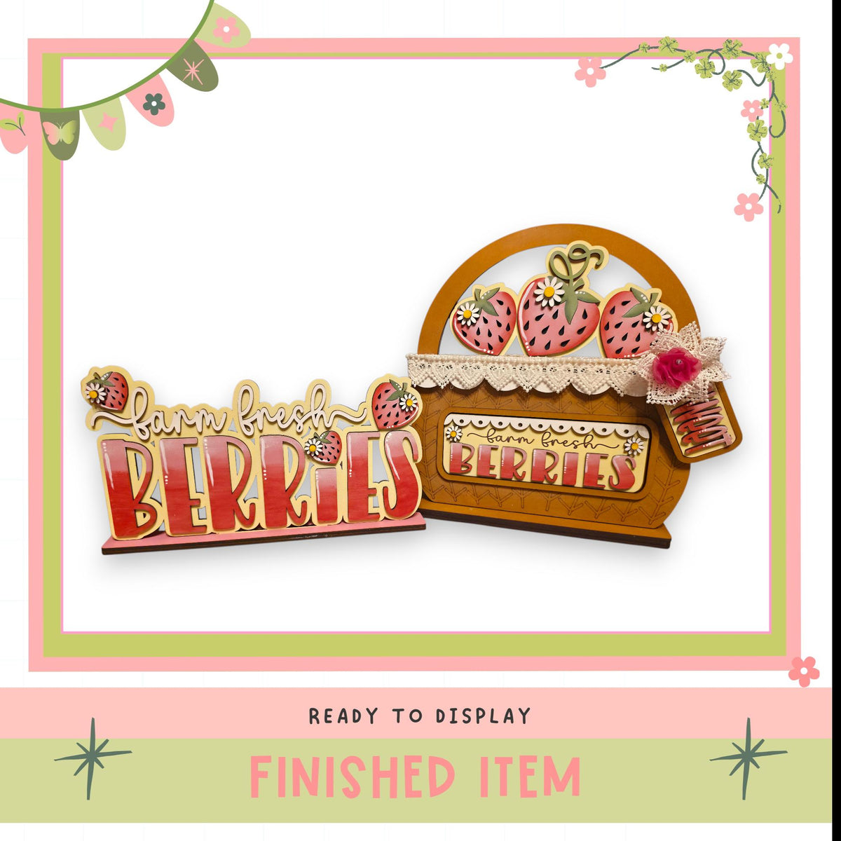 a wooden sign with the word "BERRIES" written on it, along with a basket of strawberries. The sign and basket are displayed in a pink and green frame, and the image is described as a finished item, ready to be displayed.