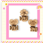 three wooden magnets with the words world's best mom on them