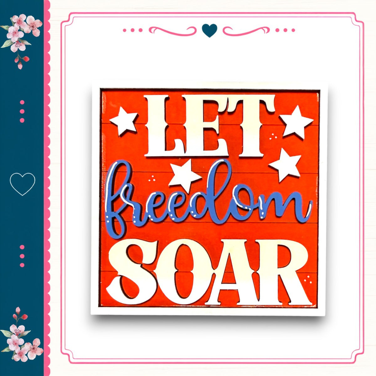 a patriotic design with the phrase "LET freedom soar" prominently displayed in large letters.