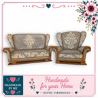 two ornate, handcrafted furniture pieces, including a sofa and a chair, with intricate floral designs on their upholstery. The furniture appears to be made of wood and has a rustic, vintage aesthetic. The image is framed by a decorative border with floral elements, and the text "Handmade for your Home - Rustic Farmhouse" is displayed, indicating that these pieces are likely intended for use in a rustic, farmhouse-style home.